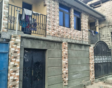 Parcelle à vendre avec 2 appartements type locatif